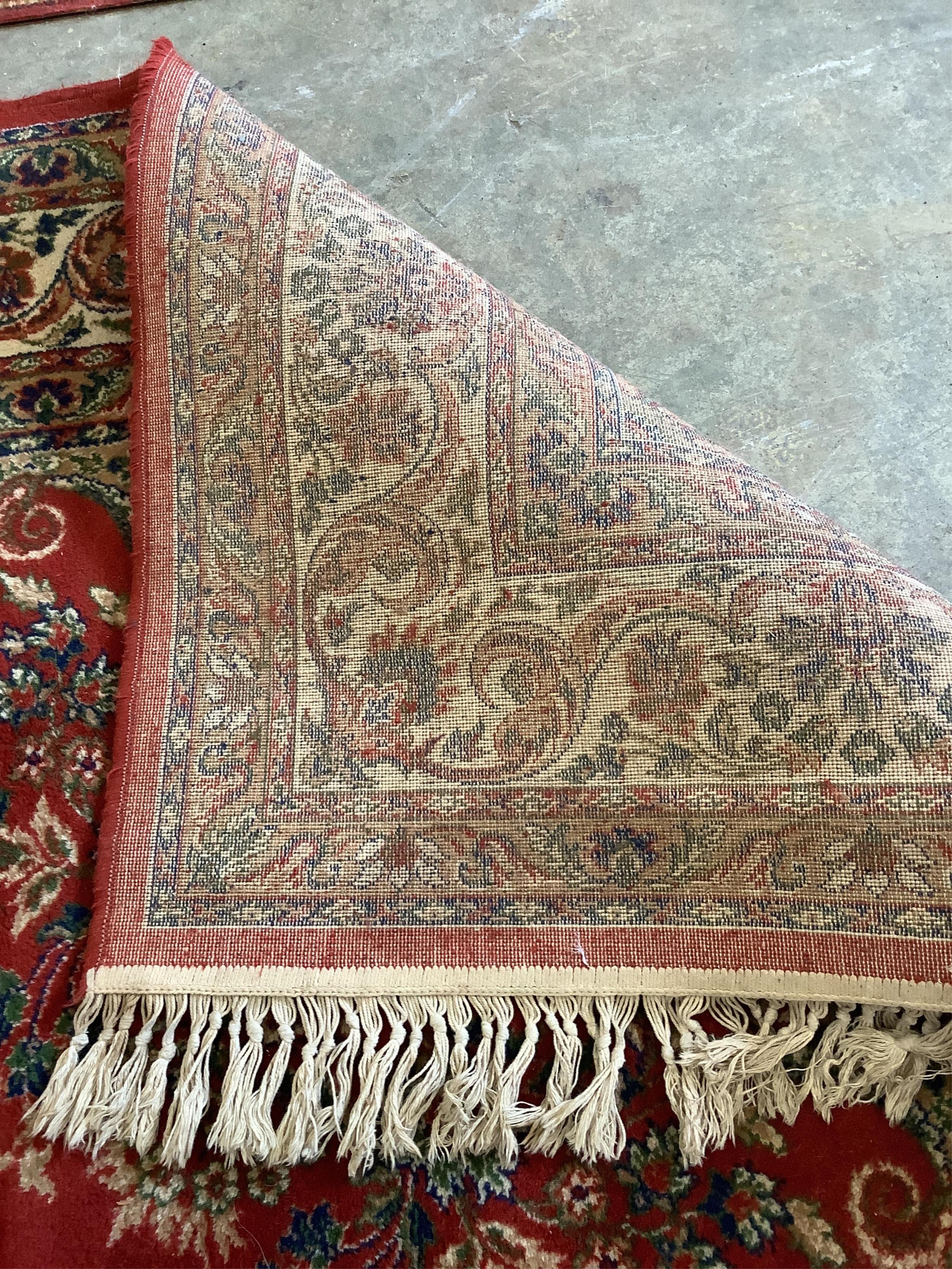 A Kandahar red ground rug and a similar runner, larger 294 x 200cm (2). Condition - poor